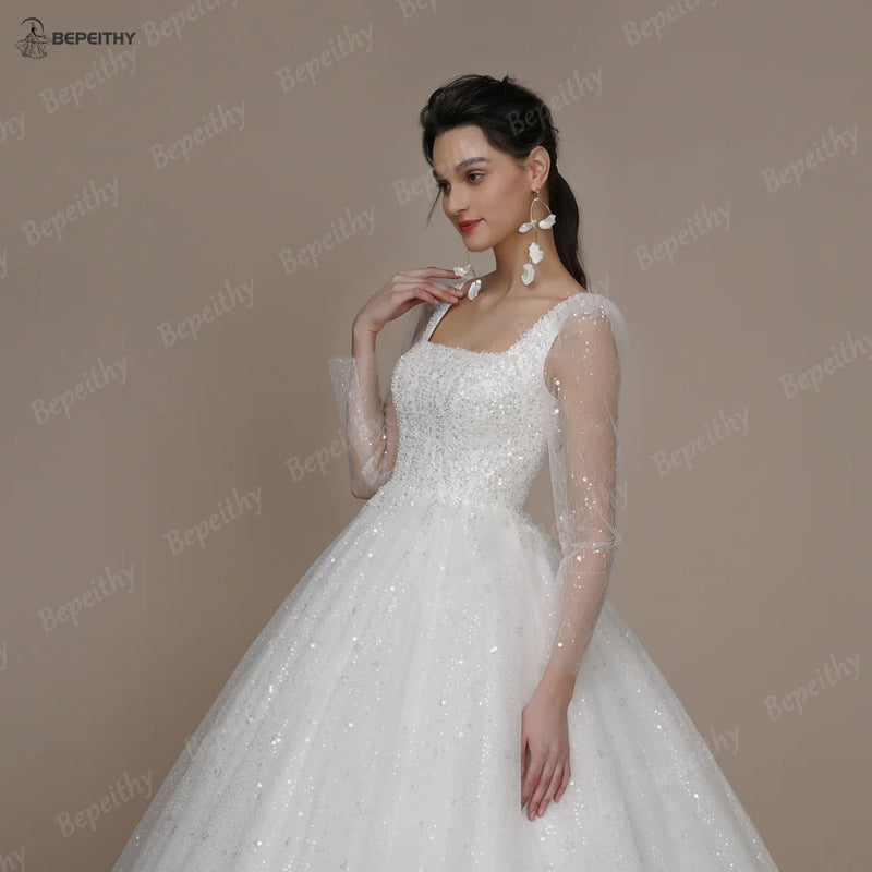 BEPEITHY Shinny Ivory Square Bride Wedding Dresses For Women Long Sleeves Glitter Open Back Bridal Modern Ball Gown 2023 Spring