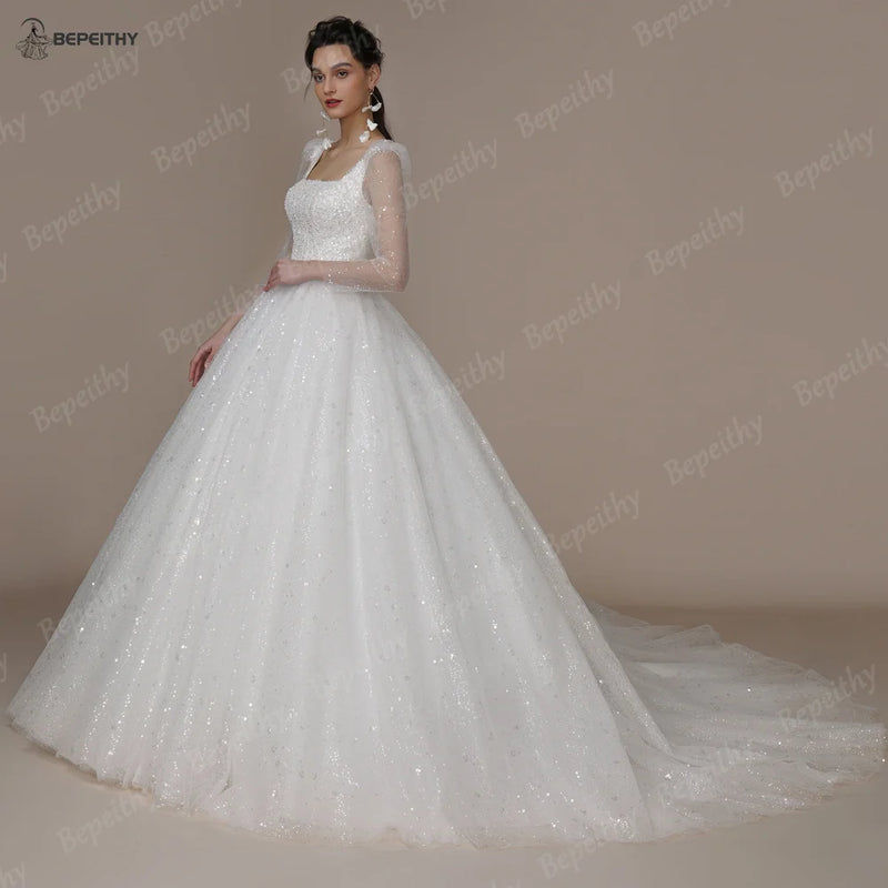 BEPEITHY Shinny Ivory Square Bride Wedding Dresses For Women Long Sleeves Glitter Open Back Bridal Modern Ball Gown 2023 Spring
